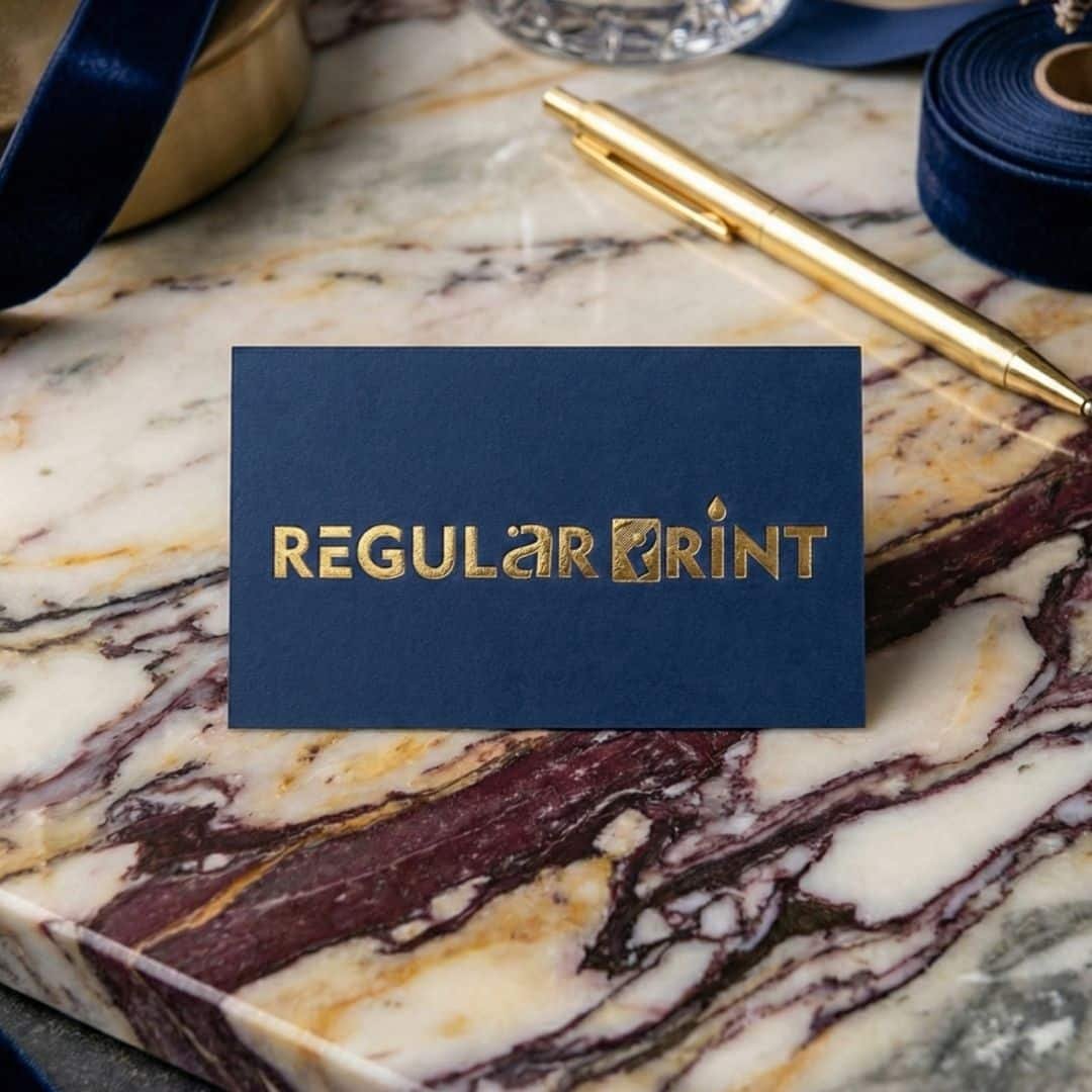 Premium navy blue business cards with gold foil branding - Regular Print Canada